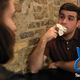 A man on a date eating a Wet Ones wipe.